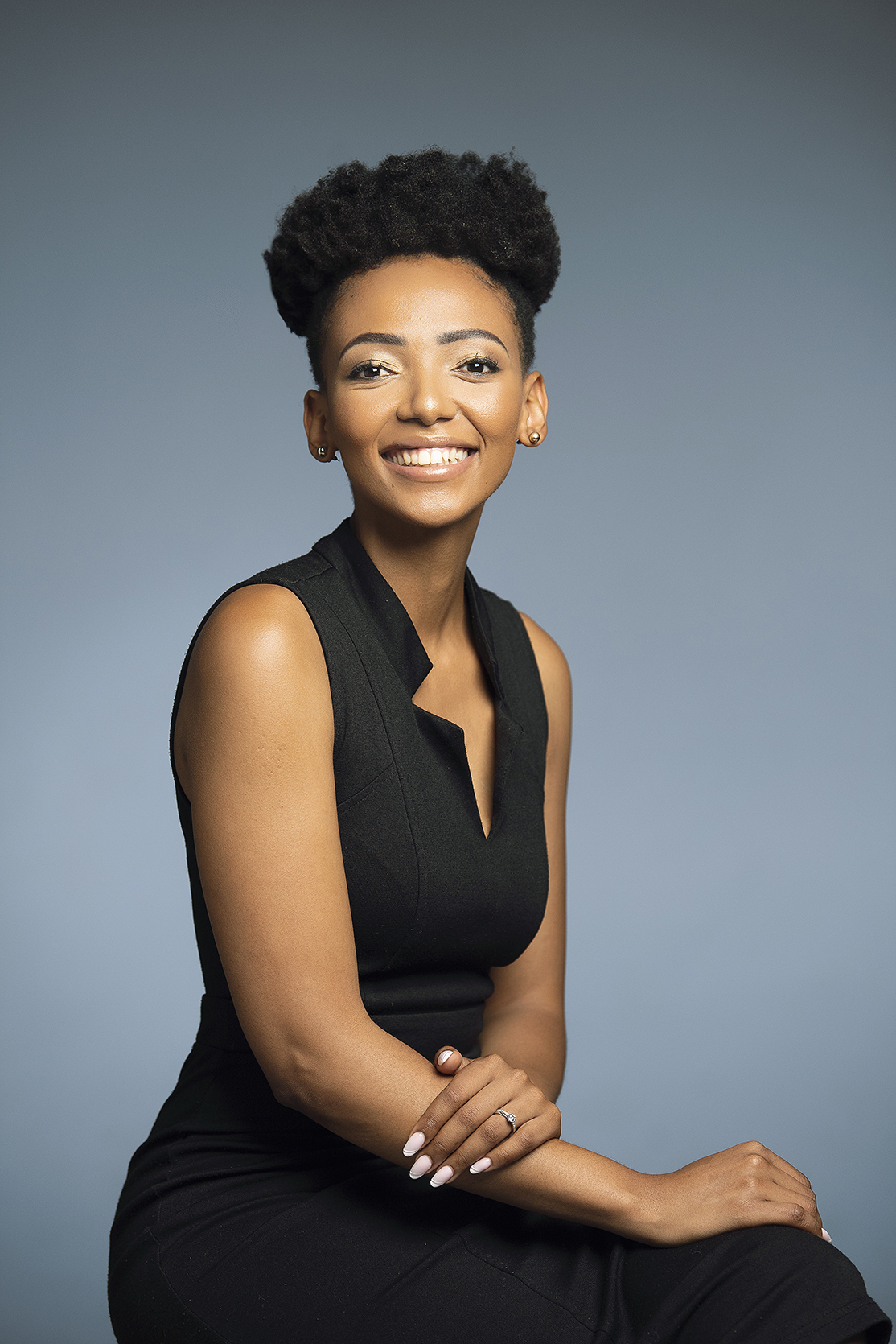 corporate-female-linkedin-professional-headshot-portrait-by-kevin-mark-pass-photographer Woman's professional corporate headshot for CV/ LinkedIn shot on dark studio backdrop shot by Kevin Mark Pass Photography, makeup by Storm Pass Makeup