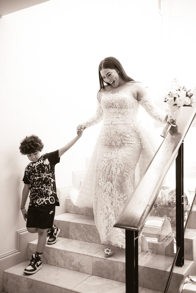 Candid moment sepia/ black & white shot by Kevin Mark Pass Photography, for R&A wedding