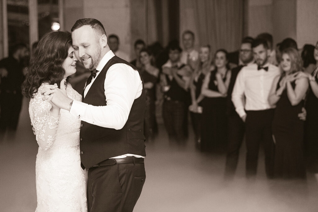 Candid sepia moment for J&J wedding by Kevin Mark Pass Photography, bridal makeup by Storm Pass at Shepstone Gardens venue