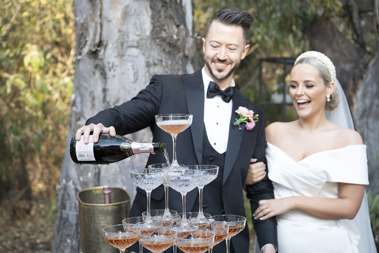 Candid bride and groom portraits for L&N on their special day shot by Kevin Mark Pass Photography